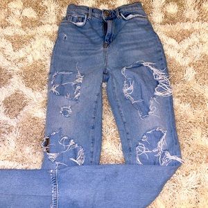Urban Outfitters ripped patch jeans